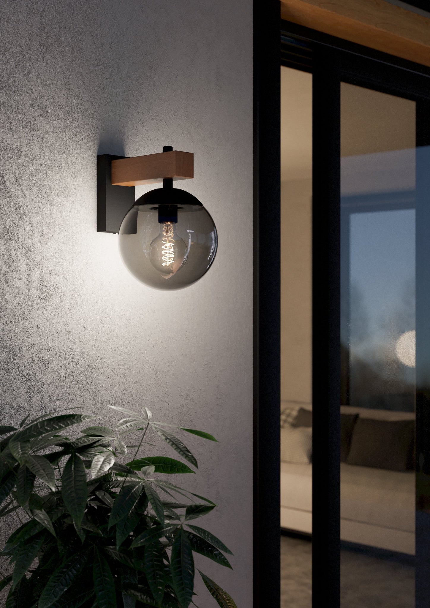 BUFALATA Outdoor wall light in black, brown, and translucent black plastic